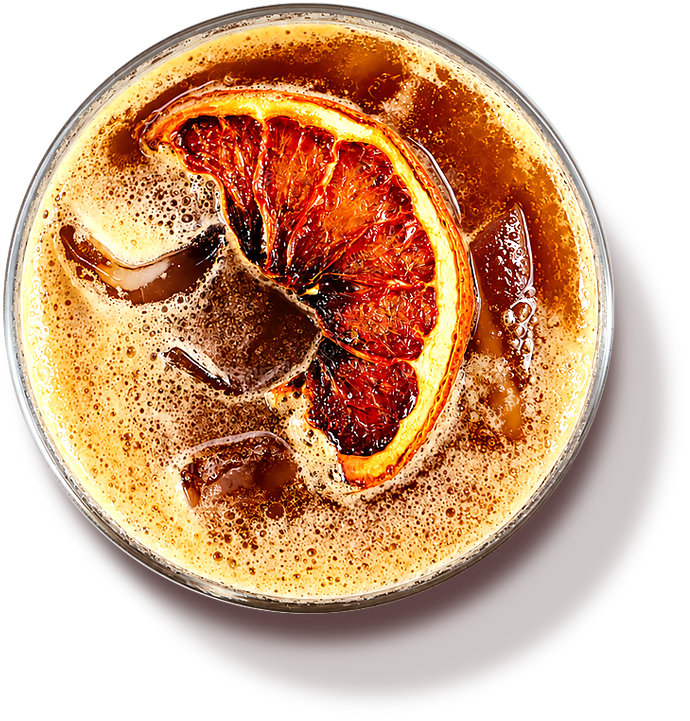 An iced coffee garnished with a dried orange wheel